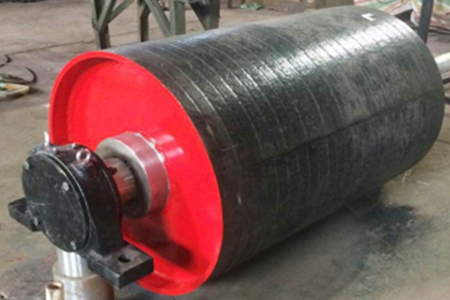 What is the main reason for the damage of the belt conveyor roller?